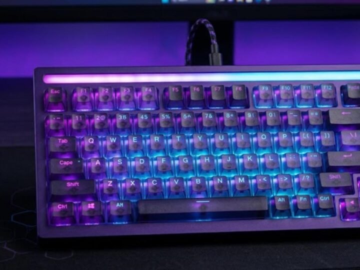 MCHOSE Ace 75 style 75% Hall Effect gaming keyboard with purple and blue RGB backlight and light bar on a dark desk